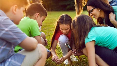 EAL learners learning outside in nature